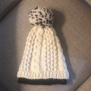 Brown and white winter hat